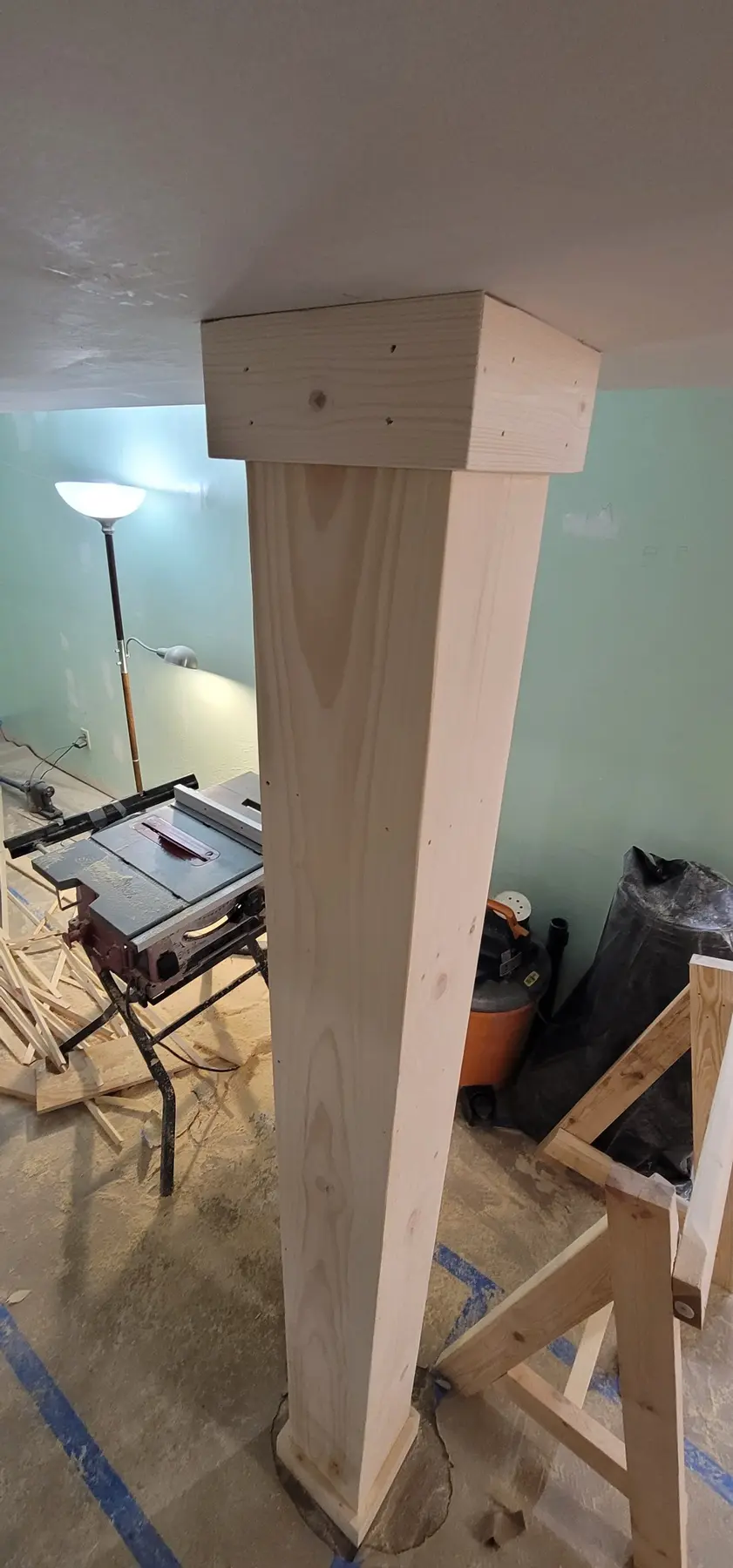 Finished box-beam column with cap and base trim detail