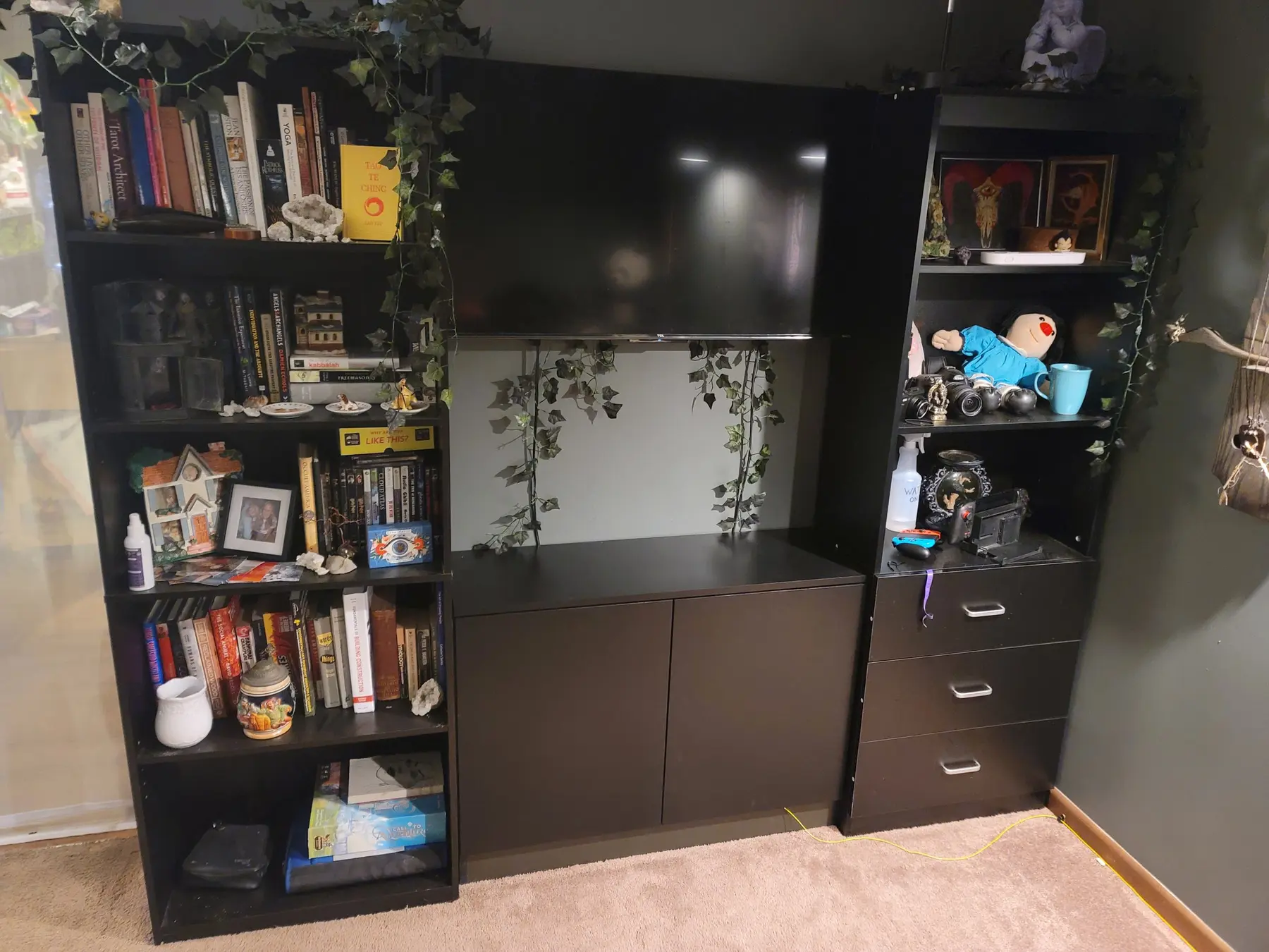 Dark-finished built-in media cabinet with open shelving and closed lower cabinets, personal project